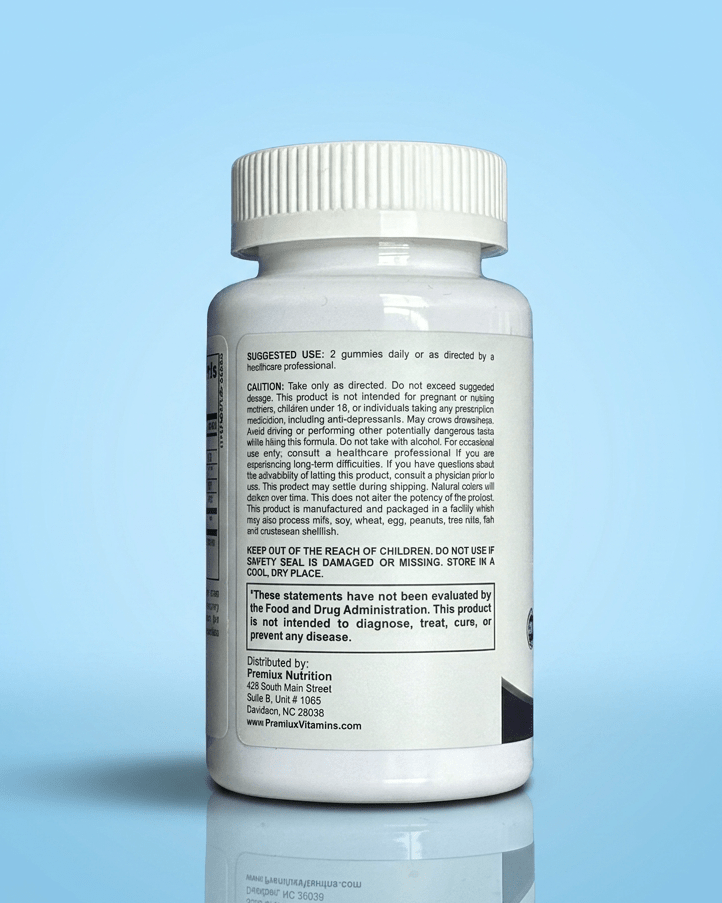 Premiux Melatonin Gummies 5mg — Supports Healthy Sleep Onset - Premiux NutritionA white plastic supplement bottle with a ribbed cap, shown from the back against a light blue gradient background with a soft reflection below. The label contains black text and a small dark graphic in the bottom right corner.199874207056