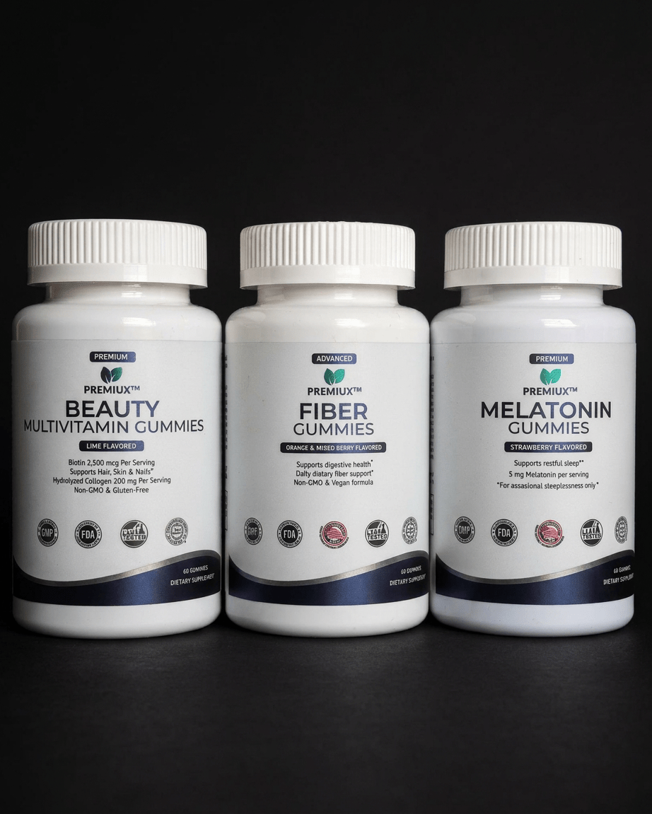 The Beauty Sleep Ritual — AM Glow, PM Calm Bundle (Beauty Multi + Fiber + Melatonin) - Premiux NutritionThree white supplement bottles of Premium Health gummies arranged side by side on a black background. The bottles are labeled Beauty Multivitamin Gummies, Fiber Gummies, and Melatonin Gummies.